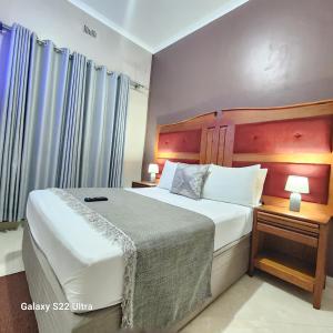 En eller flere senge i et værelse på The Princess Guest House