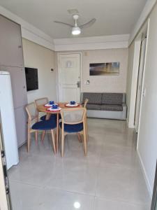 TV a/nebo společenská místnost v ubytování Flat Na Praia da Costa