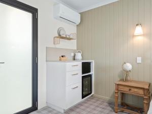 Kuchyň nebo kuchyňský kout v ubytování Village Inn Canungra