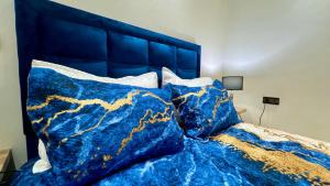 Katil atau katil-katil dalam bilik di Appart Prestige au Centre de Rabat Luxe & Confort