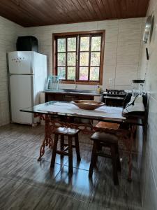 Η κουζίνα ή μικρή κουζίνα στο Apartamento em visconde de Mauá