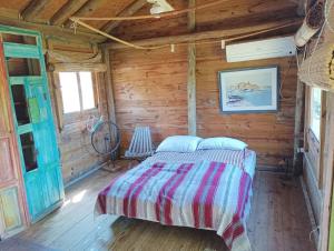 Voodi või voodid majutusasutuse Casas Punta Negra toas