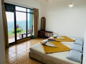 Postel nebo postele na pokoji v ubytování Green View Holiday Resort + 37 fotografií