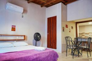 Ένα ή περισσότερα κρεβάτια σε δωμάτιο στο Flats Paz