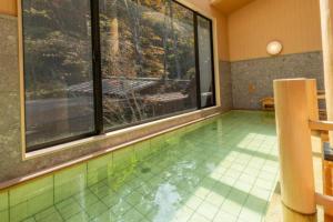 Bazén v ubytování Shionoyu Onsen Rengetsu nebo v jeho okolí