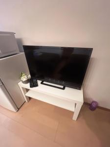 TV a/nebo společenská místnost v ubytování Reifa Dobutsuenmae No3