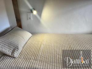 Katil atau katil-katil dalam bilik di Hostel Djambai