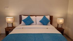 Kutus Bali Guesthouse客房内的一张或多张床位