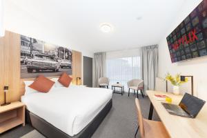 Littomore Hotel on Stewart, Bathurst客房内的一张或多张床位