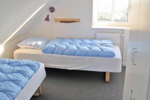 Katil atau katil-katil dalam bilik di Nice Home In Rudkøbing With 3 Bedrooms And Wifi