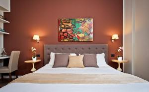 Postel nebo postele na pokoji v ubytování Delle Vittorie Luxury Rooms&Suites