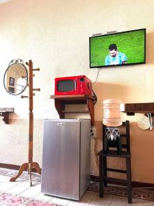 TV a/nebo společenská místnost v ubytování La Casita de Juana Pancha + 26 fotografií