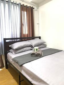 - une chambre avec 2 lits jumeaux dans l'établissement Netflix & Chill at Pablo's Homestay-Grace Residences Tower 4, à Manille 21 autres photos