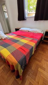 Ένα ή περισσότερα κρεβάτια σε δωμάτιο στο Savassi Hostel