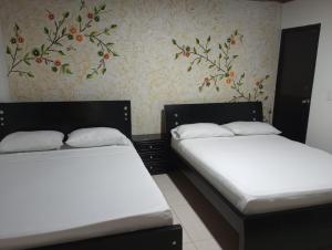 Letto o letti in una camera di Hotel Bethesda 316 a 822 a 1980