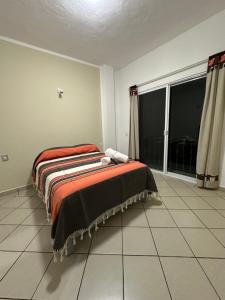 Postel nebo postele na pokoji v ubytování Casa Eva