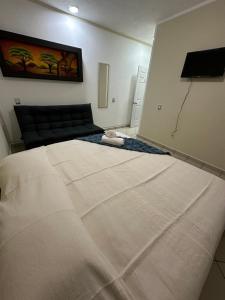 Postel nebo postele na pokoji v ubytování Casa Eva