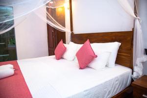 Postel nebo postele na pokoji v ubytování Sleeperwood Villa