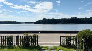 a gate in front of a body of water at Daeboodo Prince Pension in Ansan