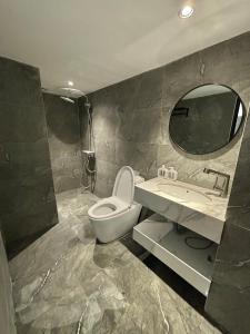 Koupelna v ubytování CEVA Hotel & Apartment Danang + 37 fotografií