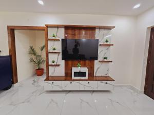 TV a/nebo společenská místnost v ubytování T Stays