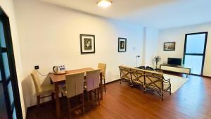 TV a/nebo společenská místnost v ubytování Villa Puspa - Larkin Bungalow Homestay