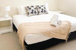 Ένα ή περισσότερα κρεβάτια σε δωμάτιο στο Glen’s Parkview Apartment 1