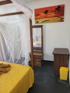 Ένα ή περισσότερα κρεβάτια σε δωμάτιο στο Pearl IN