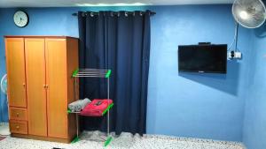 Μια τηλεόραση ή/και κέντρο ψυχαγωγίας στο Faridd homestay