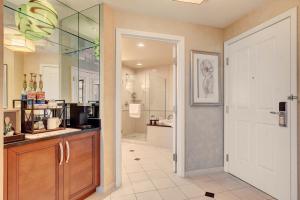 a bathroom with a walk in shower and a sink at MGM Studio Suite with POOL VIEW Tower 1 in Las Vegas