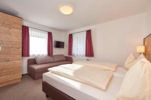 Letto o letti in una camera di Pension Gabi