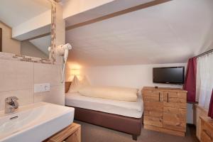 Letto o letti in una camera di Pension Gabi