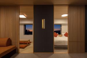 a room with a bedroom with a bed and windows at Tokyu Vacations Osaka Midosuji in Osaka +26 photos