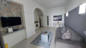 TV a/nebo společenská místnost v ubytování The Hampton Exclusive Guesthouse