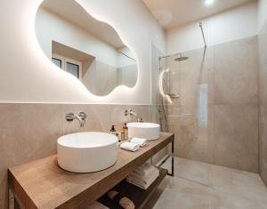 a bathroom with a sink and a shower at House of Ble in Vienna +126 photos