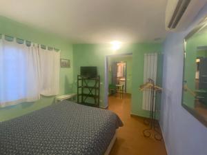 Postel nebo postele na pokoji v ubytování Agriturismo il fragolino