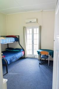 Postel nebo postele na pokoji v ubytování Hotel Metropole Proserpine