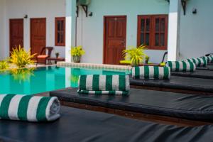 The swimming pool at or close to Sundowners Guesthouse