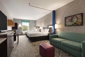 Postel nebo postele na pokoji v ubytování Home2Suites by Hilton Florence