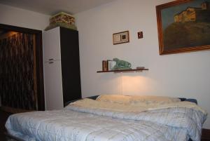 En eller flere senge i et værelse på Perla sul porticciolo