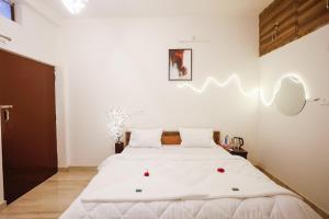 Postel nebo postele na pokoji v ubytování Kasha Homestay
