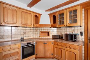 Kuchyň nebo kuchyňský kout v ubytování Ferienhaus Villa Kanisblick