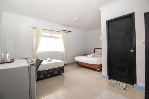 Voodi või voodid majutusasutuse Allisa Resort Hotel toas
