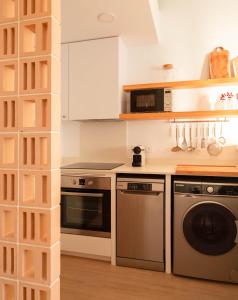 Nhà bếp/bếp nhỏ tại Habitatges Turístics Riba Pitxot - Es Cucurucuc