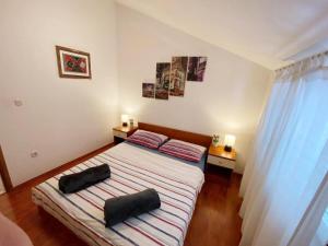 Posteľ alebo postele v izbe v ubytovaní Apartments Mila
