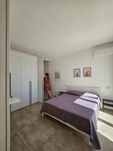Posteľ alebo postele v izbe v ubytovaní Villa Vannì