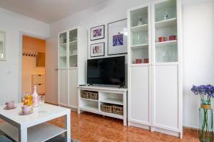 Μια τηλεόραση ή/και κέντρο ψυχαγωγίας στο Casa Rosa - in the center of Caleta de Fuste