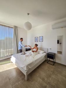 Posteľ alebo postele v izbe v ubytovaní Villa Vannì + 27 fotografií