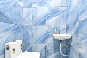 Baðherbergi á FabHotel Somnath
