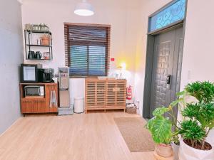 Kuchyň nebo kuchyňský kout v ubytování Gardenstay